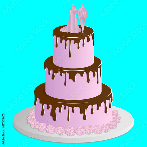 Wedding cake with figurines of the bride and groom