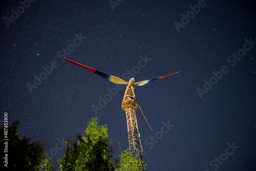 Wind elevator generator against the background of the night sky