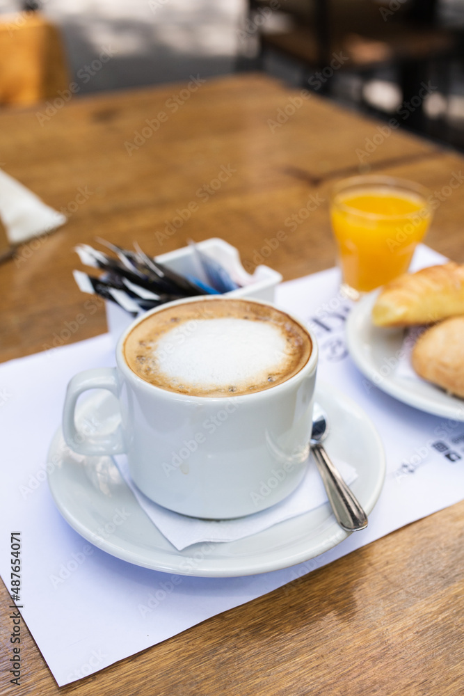 coffee with milk with orange juice and croissants coffee with milk with orange juice and croissants