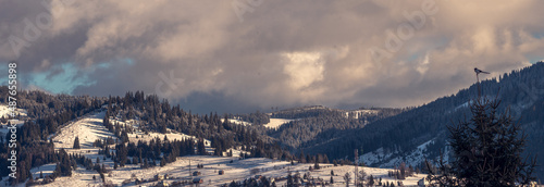 Amazing sunrise. Winter forest. High mountains with snow white peaks.  Location place Carpathian, Vatra Dornei, Bucovina, Suceava, Romania, Europe. © Victoria Moloman