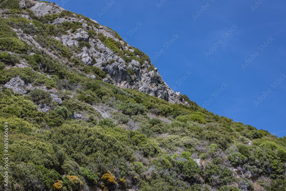 Rocky slope seen from path to Porto Timoni double beach near Agios Georgios village, Corfu Island, Greece