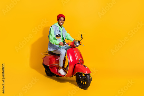 Canvastavla Portrait of attractive cheerful funky girl riding motor bike traveling holiday i
