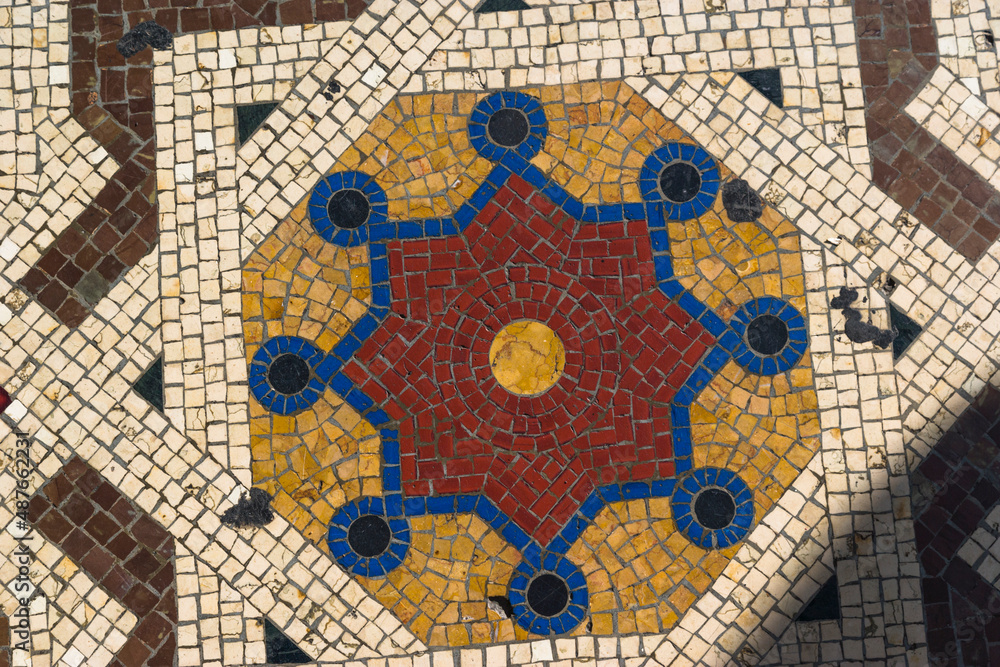 Floor mosaic at the Galleria Vittorio Emanuele II, Milano, Italy