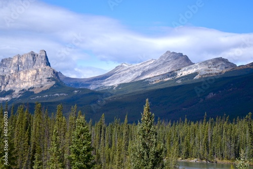 the Canadian Rockies under a cloud filled blue sky © Murray