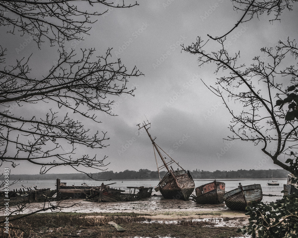 Old boats in mud at Pin Mill Suffolk