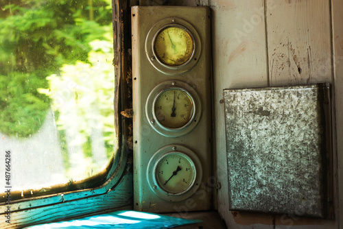 The instrument panel in the driver's cabin of an old railway train. Train on the Old railway among the forest in the mountains in Bakuriani in Georgia in summer. photo