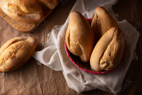 Bolillo. Traditional mexican bakery. White bread commonly used to accompany food and to prepare Mexican sandwiches called Tortas. photo