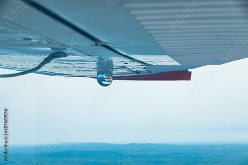 Seaplane reflection in mirror on wing