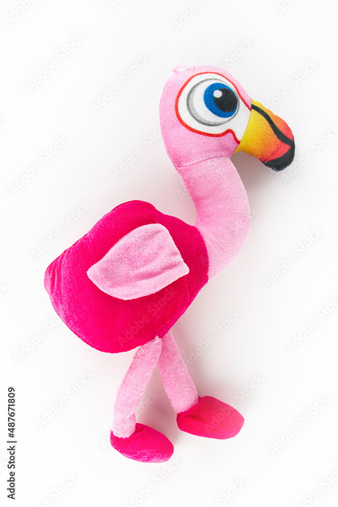 A pink flamingo plush on a white background
A pink flamingo plush on a white background
