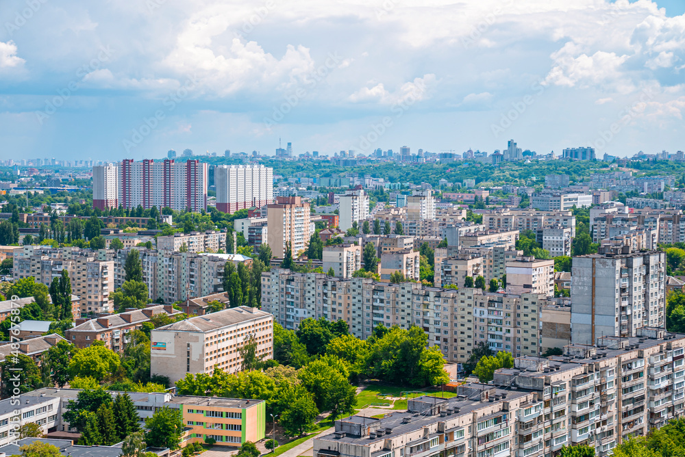 custom made wallpaper toronto digitalScenic view of cityscape with green trees on sunny day against cloudy sky, Modern exterior of residential district of Kyiv in Ukraine