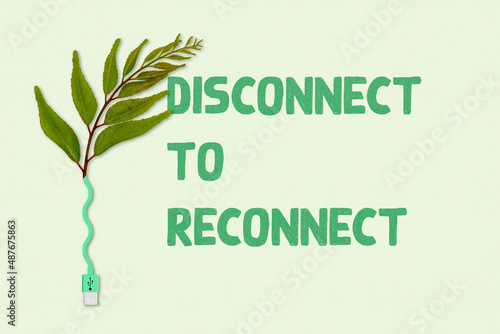 Photo Disconnect to reconnect to nature and self, green leaf plant connected to unplug