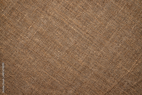 light brown burlap fabric texture. natural grunge background