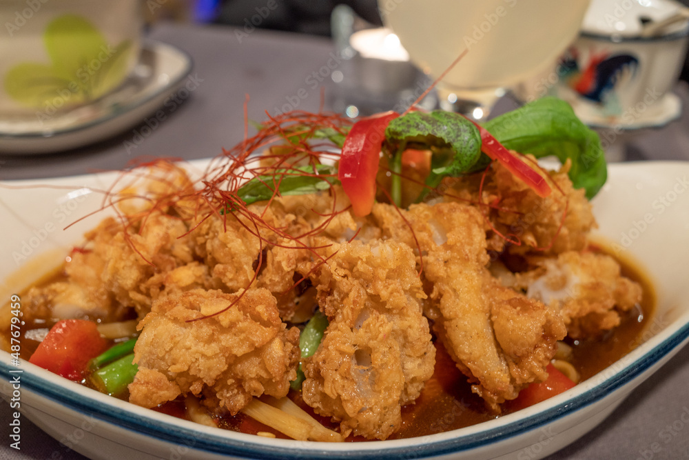 Selective focus view at asian style, Stir fry spicy crispy squid. Selective focus view at asian style, Stir fry spicy crispy squid.