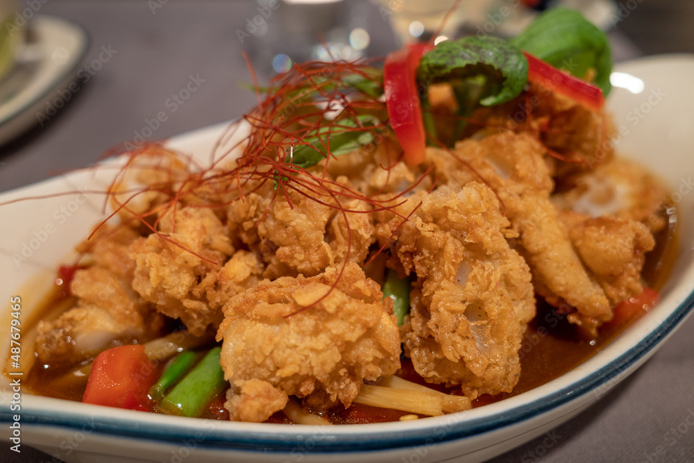 Selective focus view at asian style, Stir fry spicy crispy squid. Selective focus view at asian style, Stir fry spicy crispy squid.