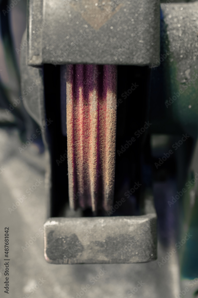 Grooves in the grinding wheel on the grinder. Grooves in the grinding wheel on the grinder.