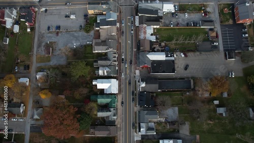 Top Down Aerial View of Street Traffic in Small American City at Autumn Season, Boonsboro, Maryland USA, High Angle Drone Shot photo
