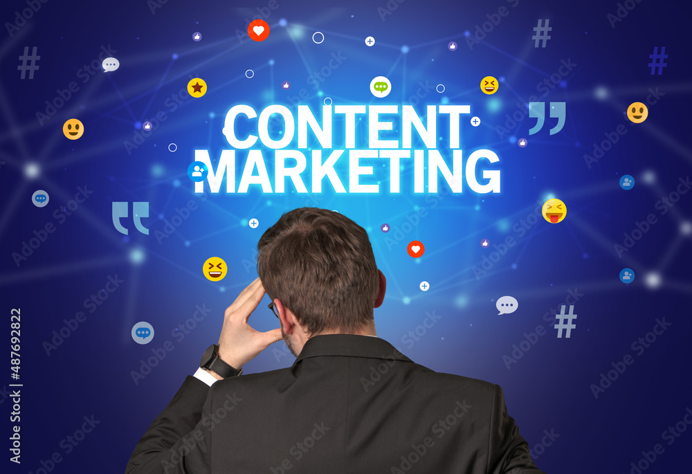 Rear view of a businessman, social media concept Rear view of a businessman, social media concept