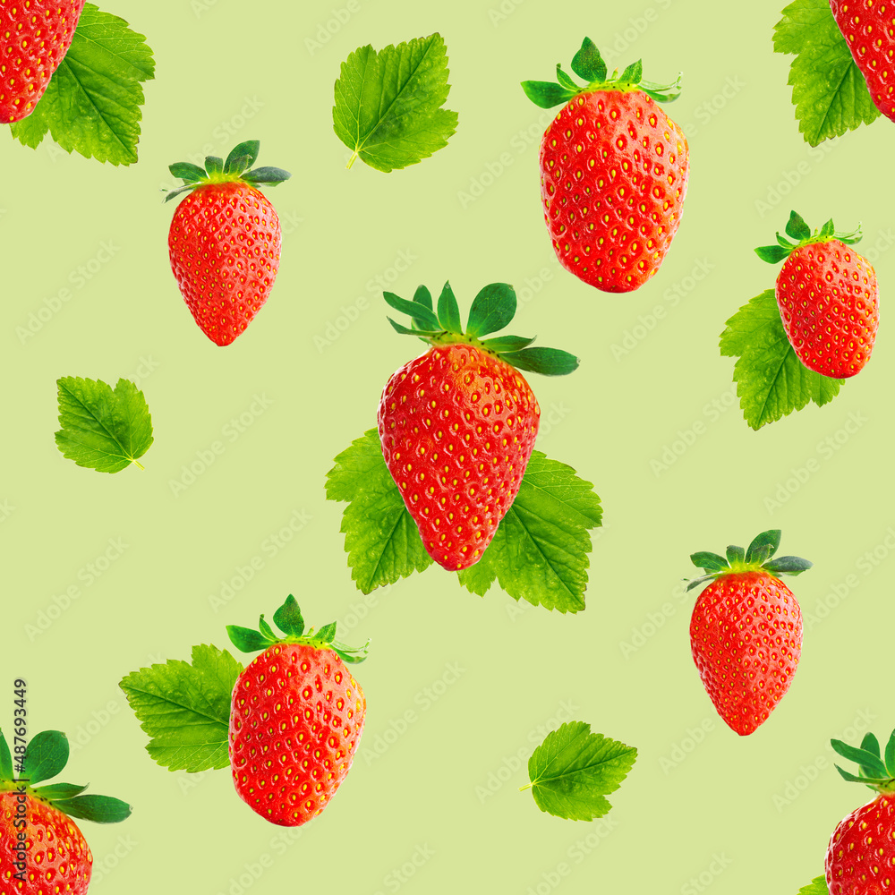 Fresh strawberry seamless pattern. Ripe strawberries isolated on green. Package design background. Falling strawberry selective focus. Fresh strawberry seamless pattern. Ripe strawberries isolated on green. Package design background. Falling strawberry selective focus.