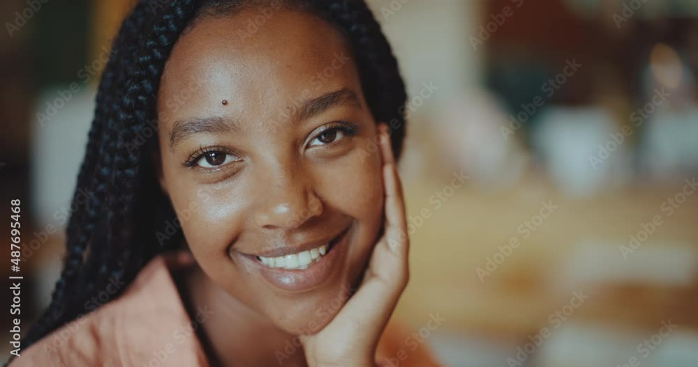 Portrait of happy smiling young black woman Portrait of happy smiling young black woman