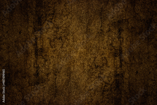 Dark brown color abstract grunge textured old concrete wall surface for background
