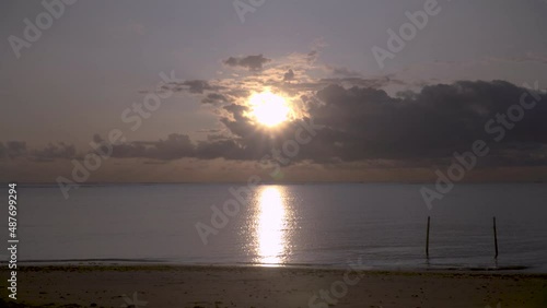 Cloudy Sunrise At The Beach