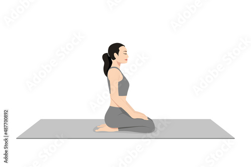 Thunderbolt Pose, Adamantine Pose, Diamond Pose. Beautiful girl practice Vajrasana. Young attractive woman practicing yoga exercise. working out, black wearing sportswear, grey pants and top, indoor