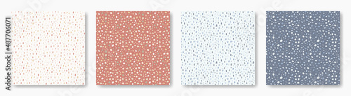 Fototapeta Naklejka Na Ścianę i Meble -  Set of abstract seamless patterns in rough polka dot style, hand-drawn doodle spots. Collection of cute printable designs in pastel soft palette.