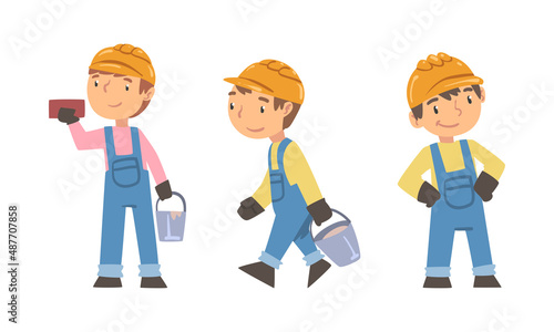 Kid builders working with construction tools set. Boys in overalls and safety hard hat cartoon vector illustration
