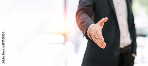 Canvas-taulu Businessman extending hand to shake.