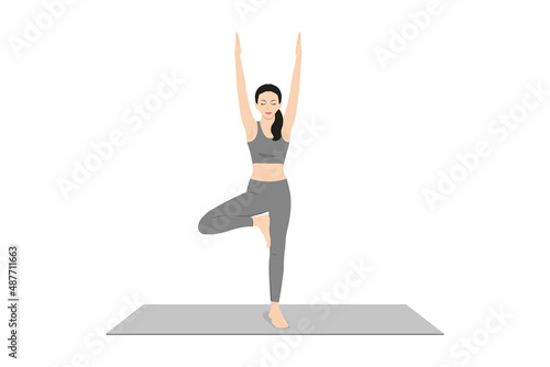 Tree Pose Volcano Pose Arms. Beautiful girl practice Vrksasana Urdhva Hastasana. Young attractive woman practicing yoga exercise. working out, black wearing sportswear, grey pants and top, indoor