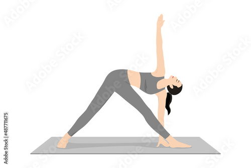 Triangle Pose. Beautiful girl practice Trikonasana. Young attractive woman practicing yoga exercise. working out, black wearing sportswear, grey pants and top, indoor full length, calmness and relax.
