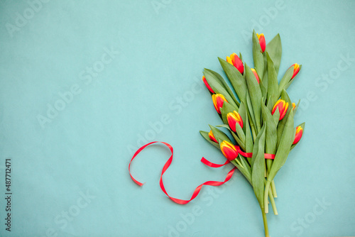 Top view photo with Valentine's Day hearts on an isolated blue background with a copy space