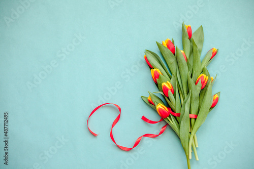 Top view photo with Valentine's Day hearts on an isolated blue background with a copy space