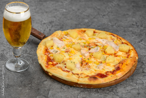glass of beer and pizza