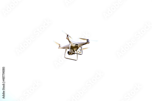 Close-up of drone is flaying against isolate white background