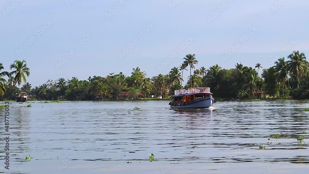 water boat running in sea backwater with cloudy sky at morning video taken at Alappuzha or Alleppey backwater kerala india. water boat running in sea backwater with cloudy sky at morning video taken at Alappuzha or Alleppey backwater kerala india.