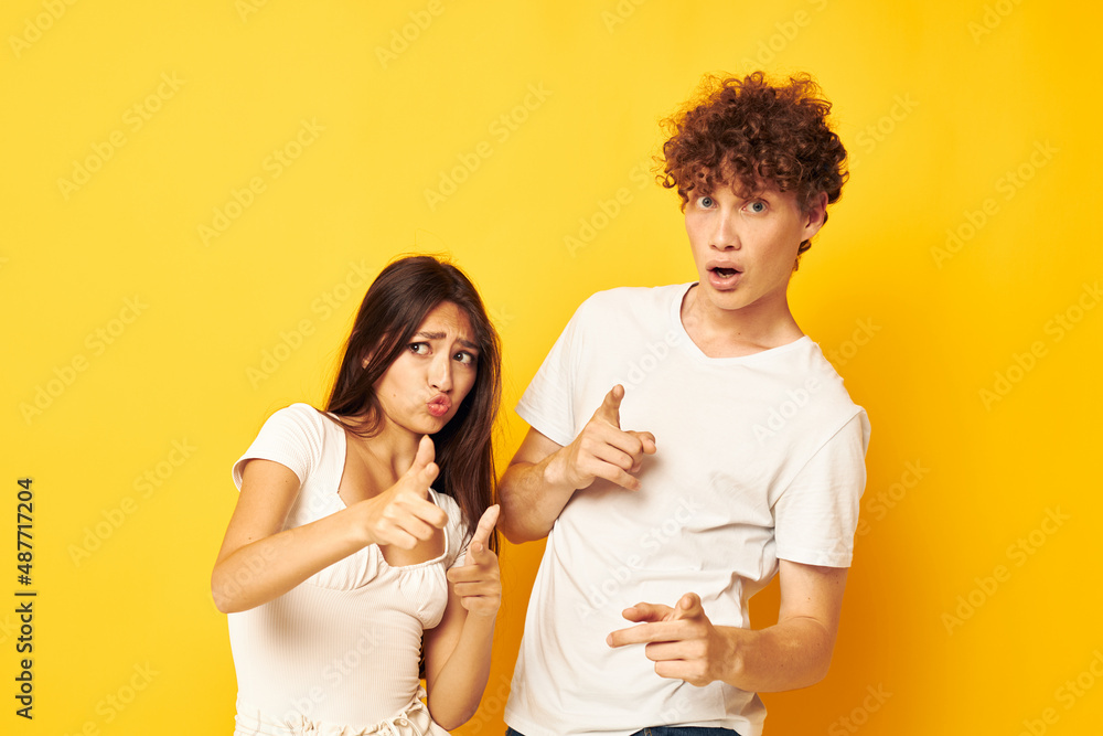 teenagers standing side by side in white t-shirts posing Lifestyle unaltered teenagers standing side by side in white t-shirts posing Lifestyle unaltered