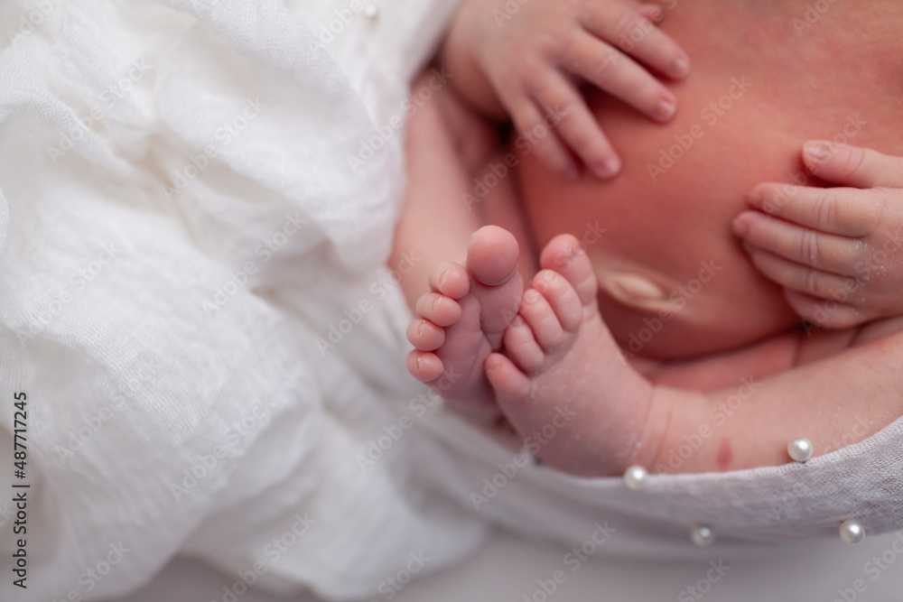 Baby little feet and toes on white background Baby little feet and toes on white background