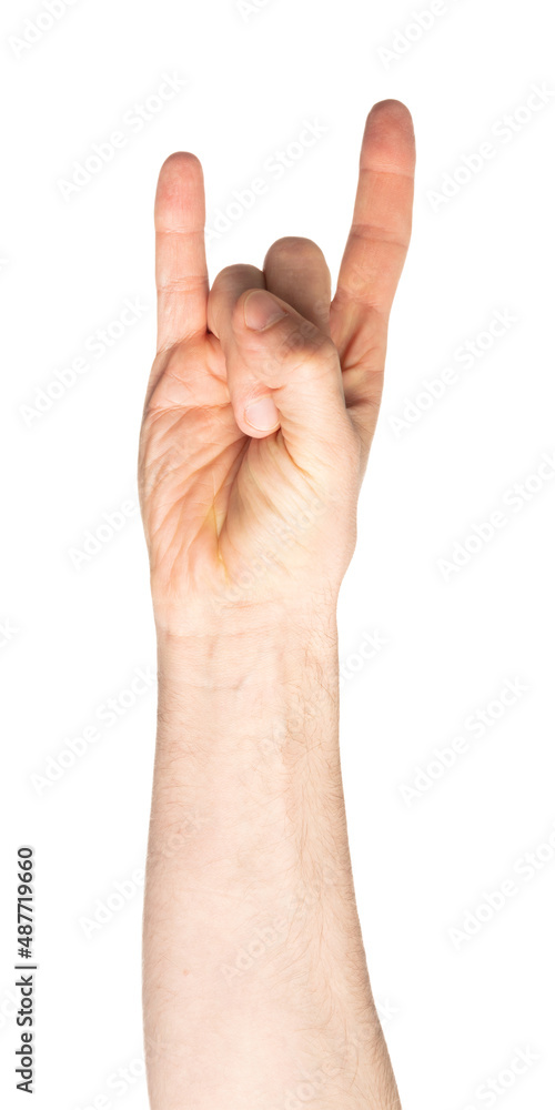 Male hand showing heavy metal rock-n-roll sign Male hand showing heavy metal rock-n-roll sign