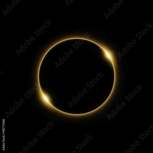 Solar eclipse in golden light in black background.