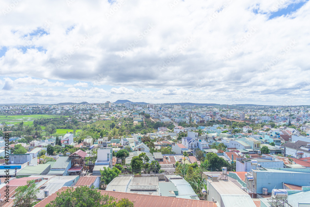 Aerial view of Pleiku city in the morning, far away is Ham Rong mountain. Travel and landscape concept.