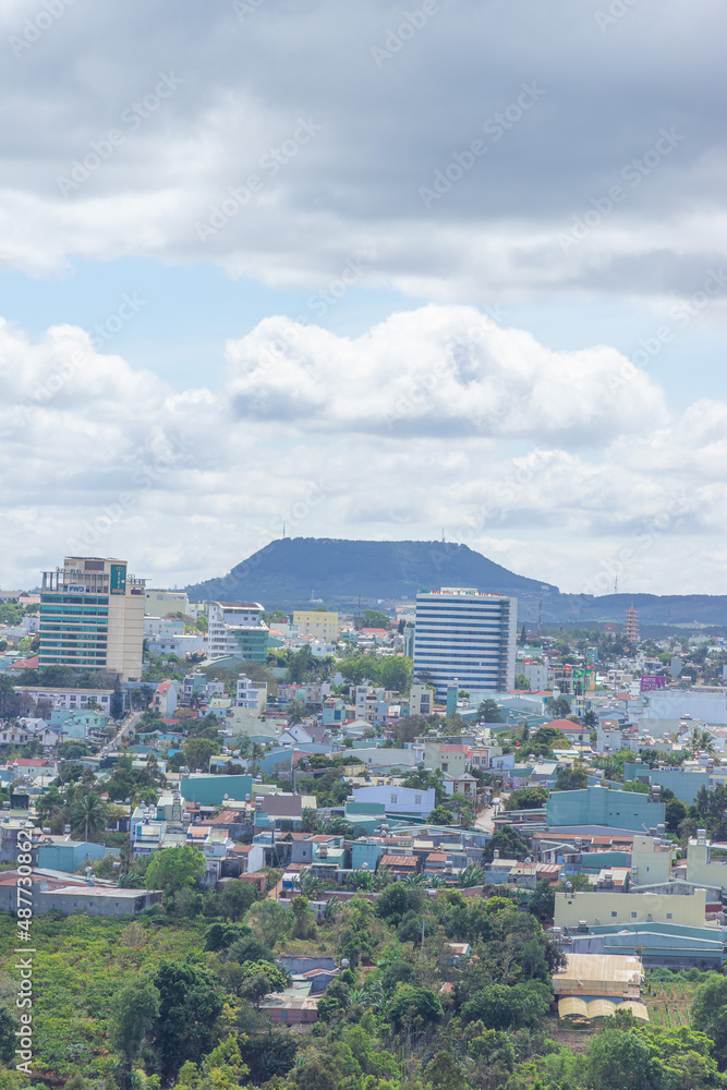 Obraz premium Aerial view of Pleiku city in the morning, far away is Ham Rong mountain. Travel and landscape concept.