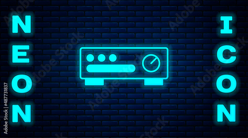 Glowing neon Sound mixer controller icon isolated on brick wall background. Dj equipment slider buttons. Mixing console. Vector