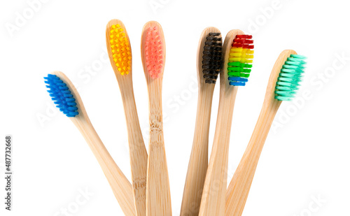 Close-Up Of Toothbrushes In Container Against White Background