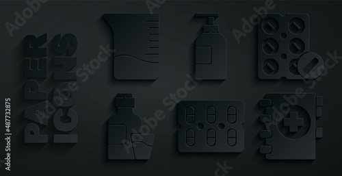 Set Pills in blister pack, Bottle of medicine syrup, Medical clipboard, Hand sanitizer bottle and Measuring cup icon. Vector