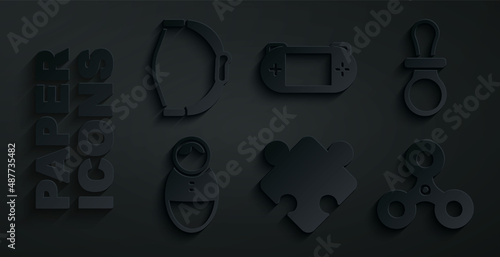 Set Puzzle pieces toy, Baby dummy pacifier, Tumbler doll, Fidget spinner, Portable video game console and Bow icon. Vector