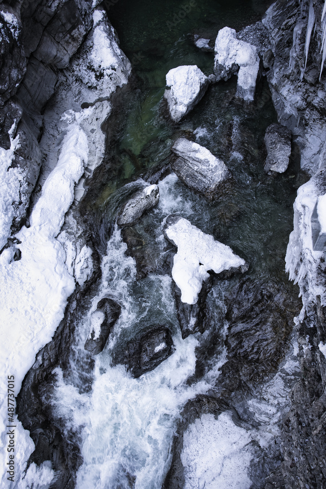 Breitachklamm - Breitach river in a winter landscape with snow and ice Breitachklamm - Breitach river in a winter landscape with snow and ice