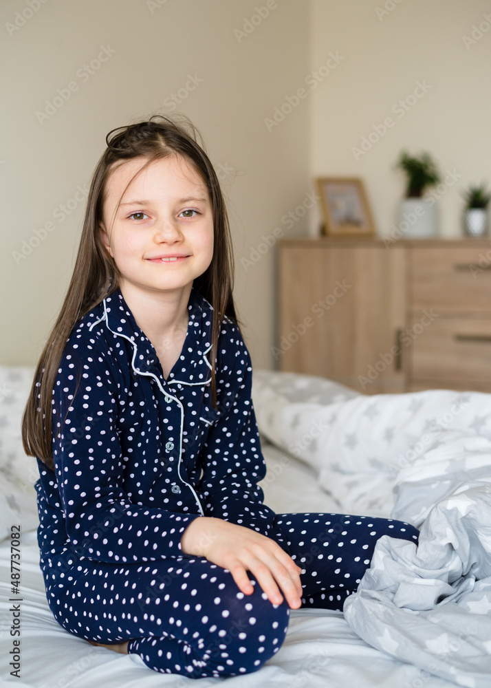 Girl wakes up. The girl woke up and stretches in the morning in bed. Girl wakes up. The girl woke up and stretches in the morning in bed.