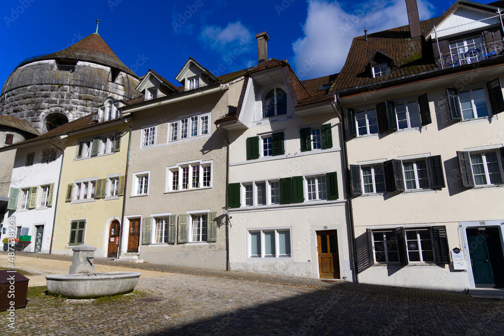Beautiful historic houses at the old town of Solothurn on sunny winter day. Photo taken February 7th, 2022, Solothurn, Switzerland.