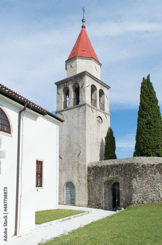 Church of St. Mark with impressive bell tower and church yard in a small hilltop town Veprinac, above Opatija Riviera, Croatia